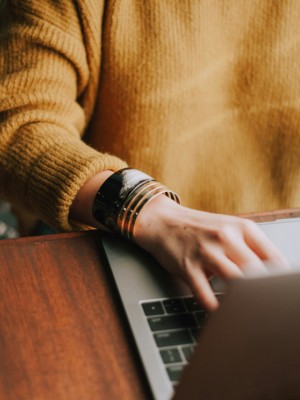 Person typing on a laptop